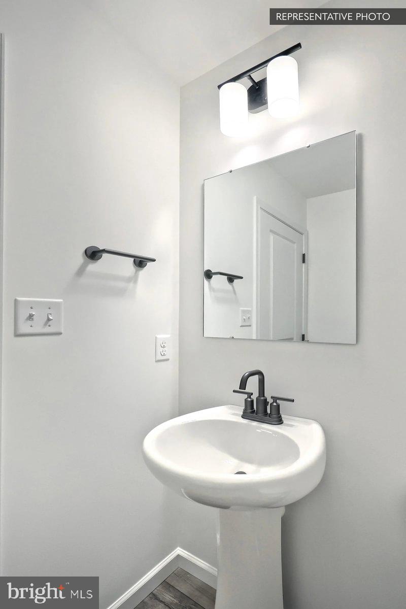 119 Redbud Road Bellefonte, PA 16823 - Photo 6 of 8 a bathroom with a sink and a mirror