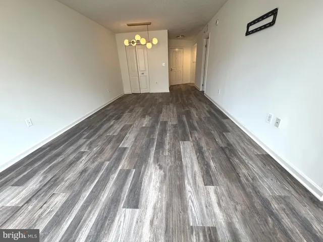 a view of a kitchen with granite countertop a sink