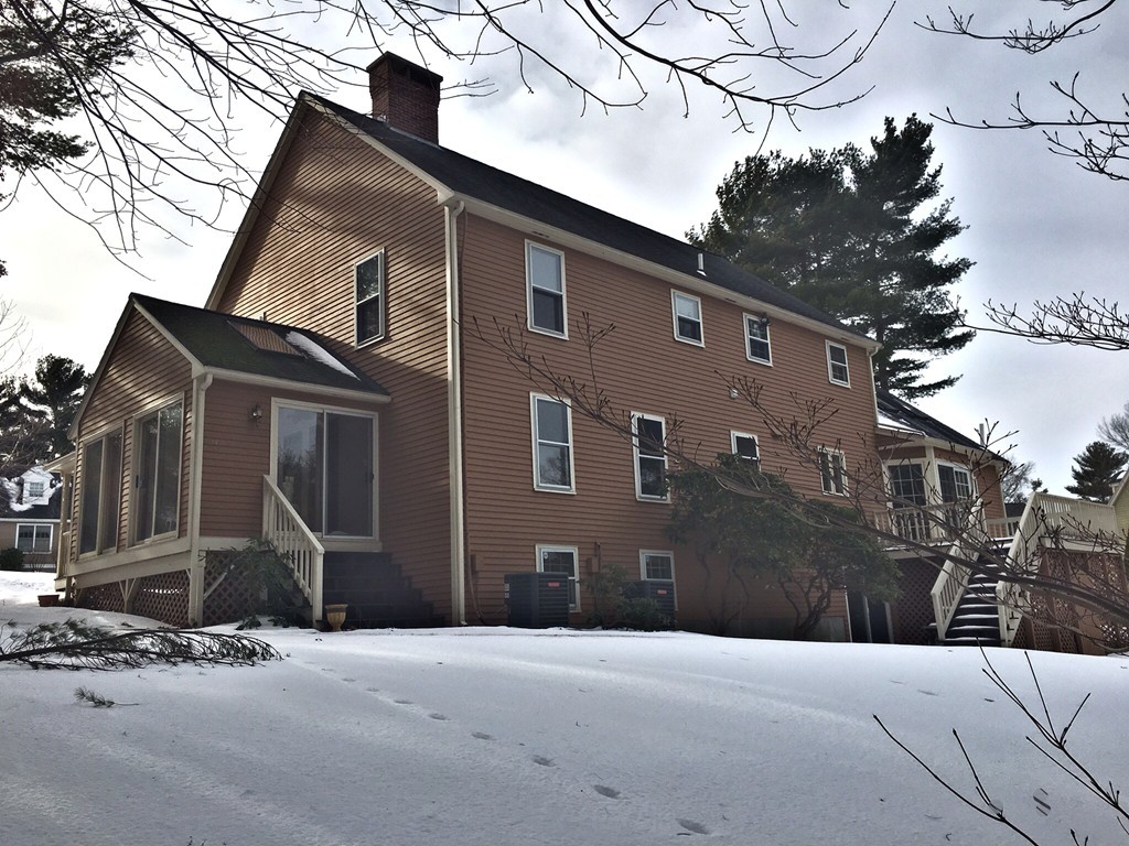 71 Emerson Road Walpole, MA 02032 - Photo 2 of 30 a front view of a house with a yard
