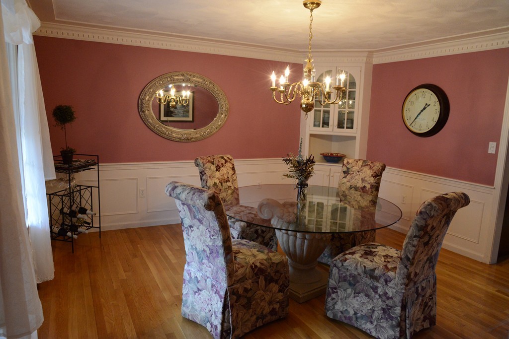 71 Emerson Road Walpole, MA 02032 - Photo 8 of 30 a view of a dining room with furniture and chandelier