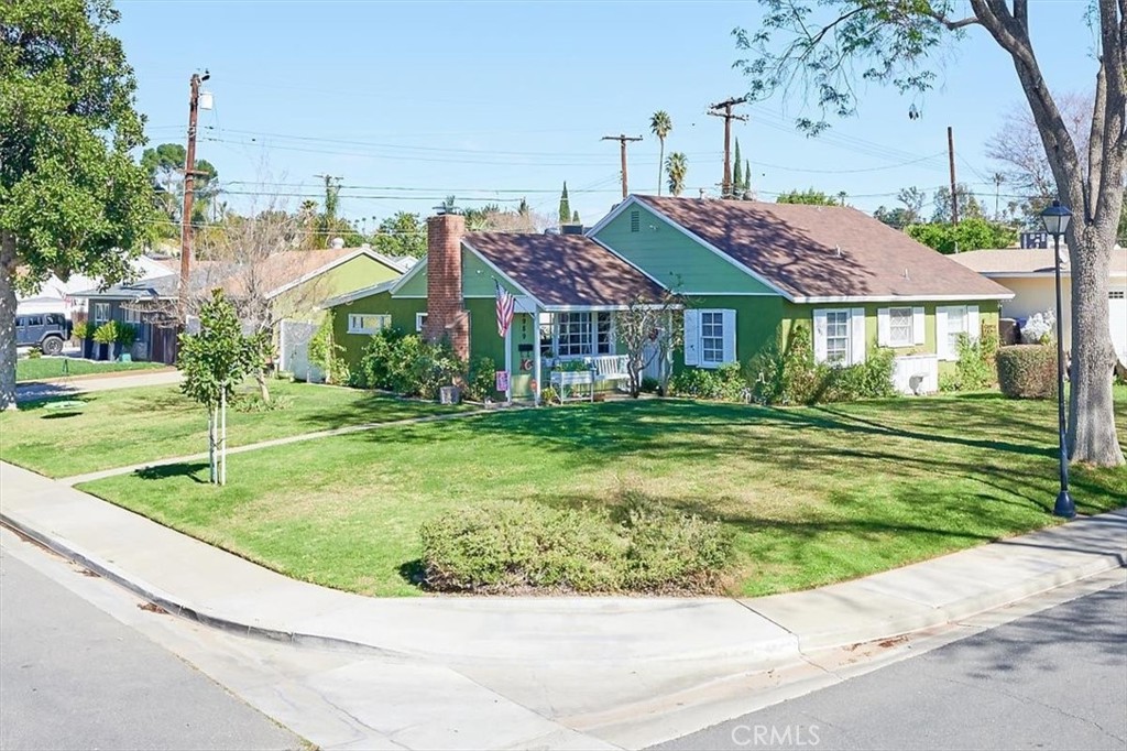 2989 Laramie Road Riverside, CA 92506 - Photo 1 of 1 a front view of a house with a garden