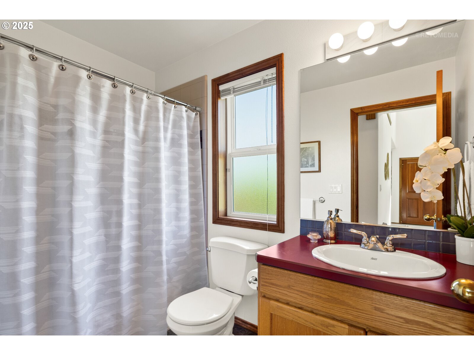 17233 Southeast McKinley Road Gresham, OR 97080 - Photo 13 of 48 a bathroom with a granite countertop sink a toilet and a mirror