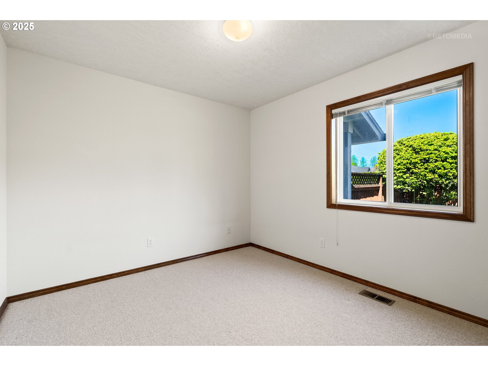 17233 Southeast McKinley Road Gresham, OR 97080 - Photo 14 of 48 a view of an empty room with a window