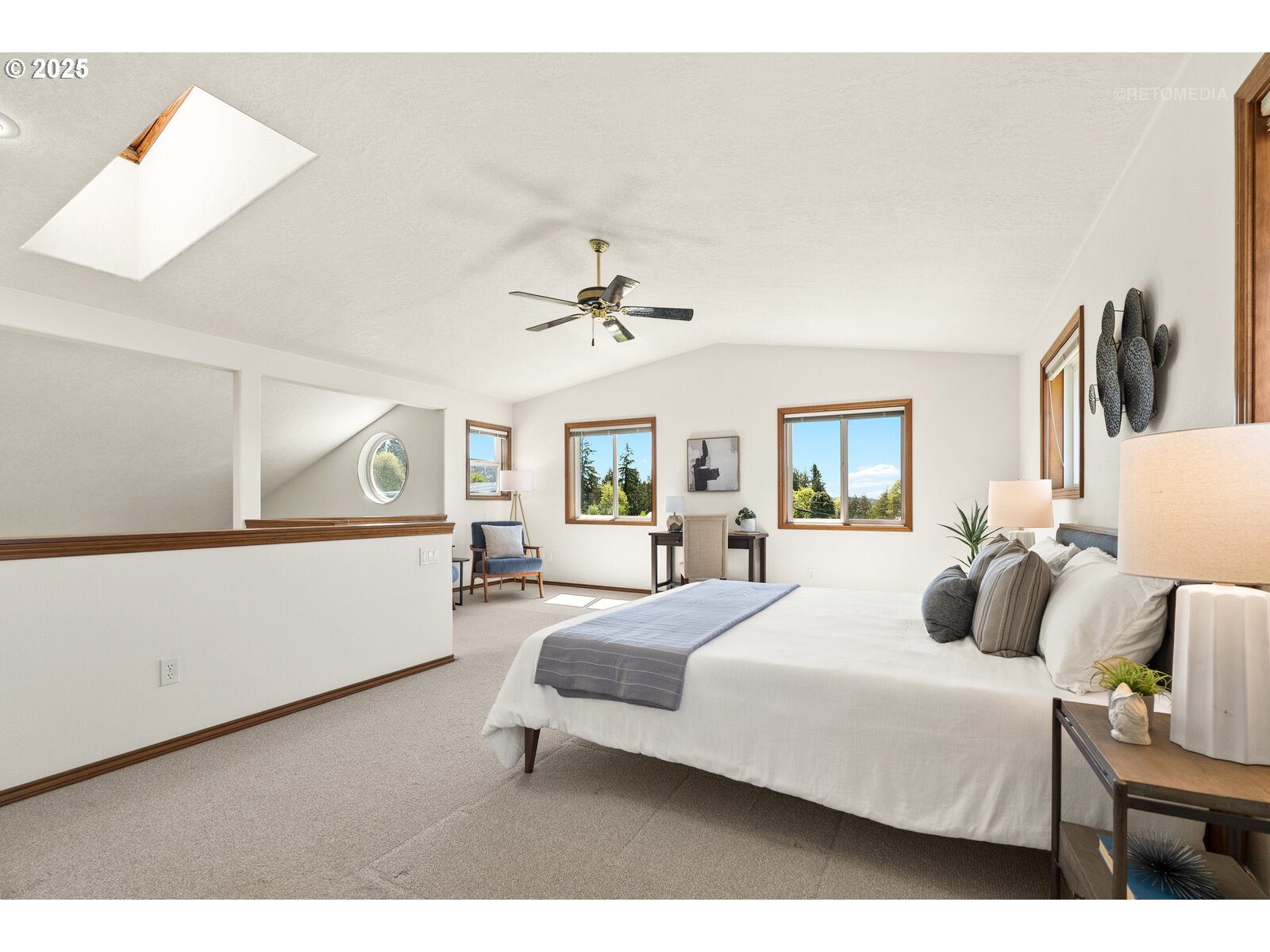 17233 Southeast McKinley Road Gresham, OR 97080 - Photo 22 of 48 a bedroom with a large bed and ceiling fan