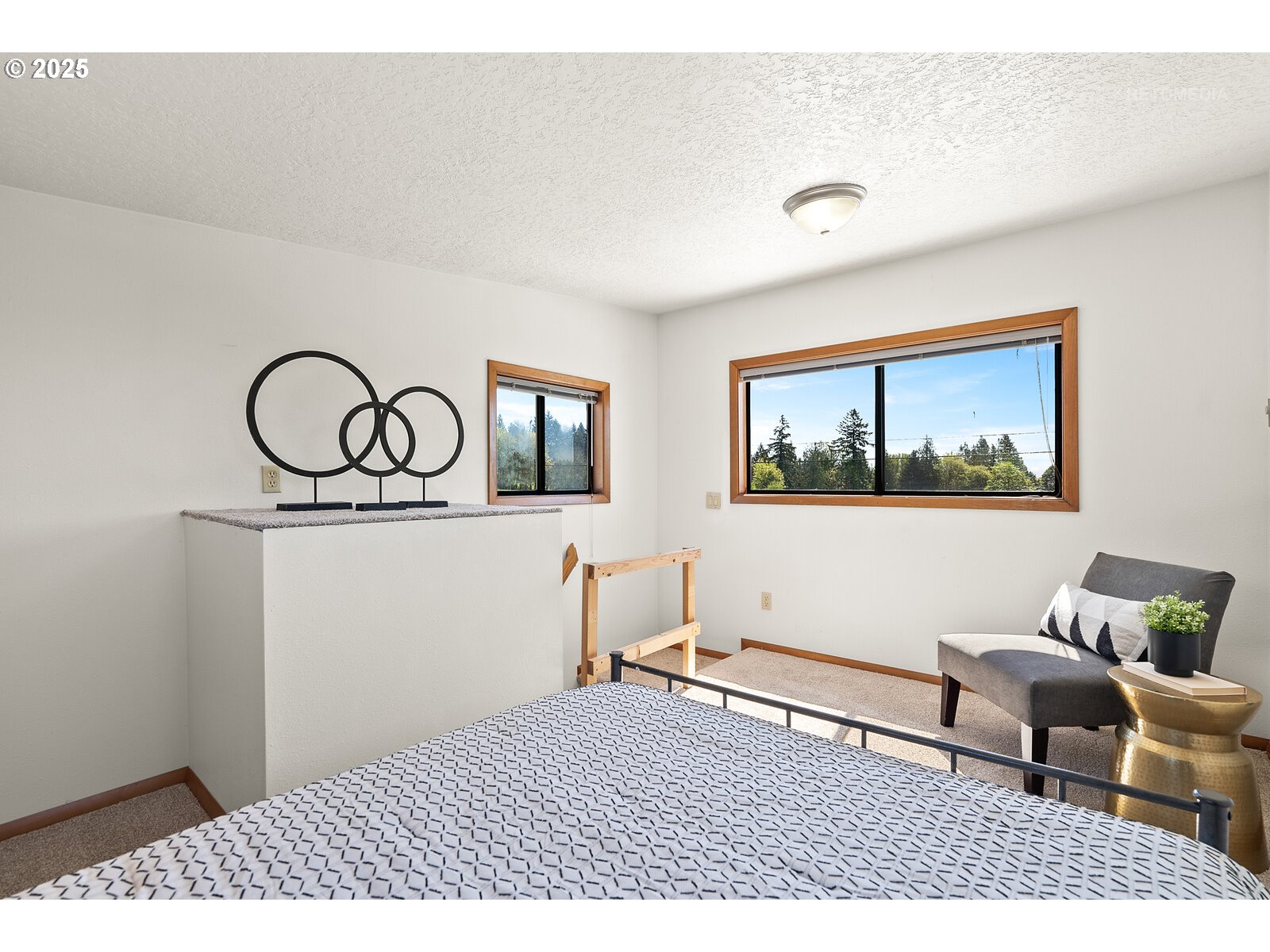 17233 Southeast McKinley Road Gresham, OR 97080 - Photo 36 of 48 a bedroom with a bed and a table