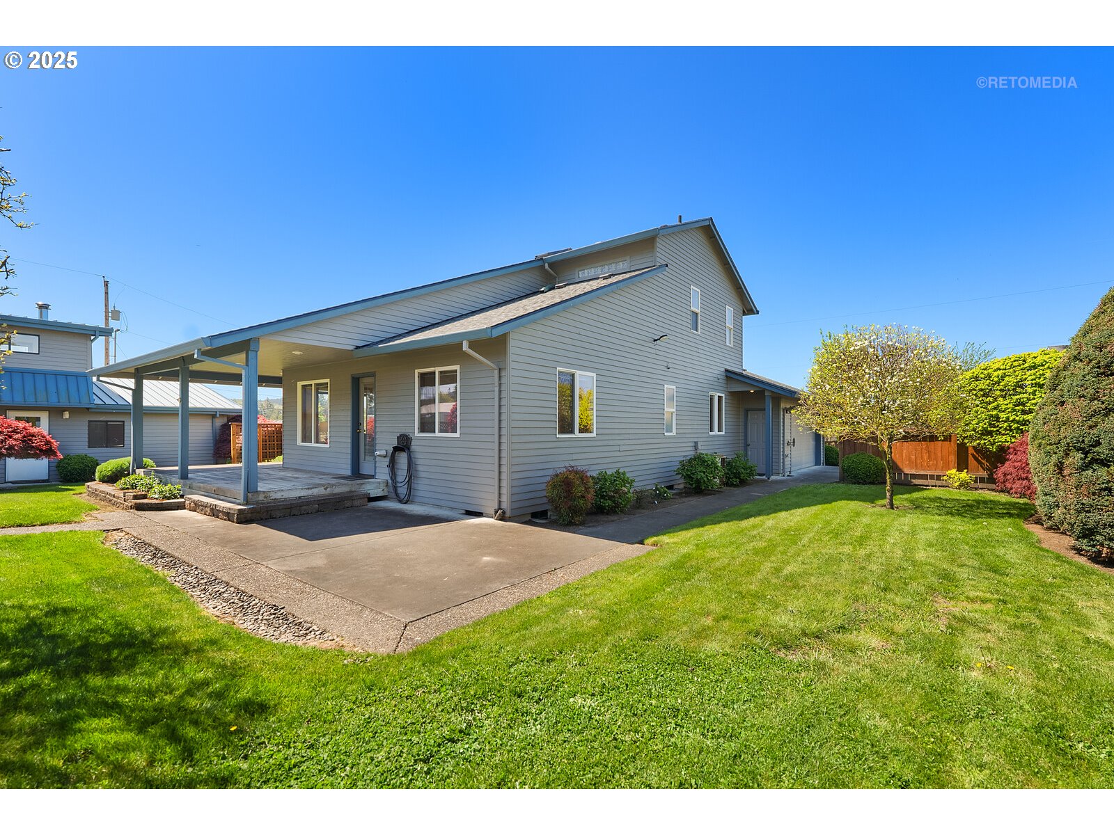 17233 Southeast McKinley Road Gresham, OR 97080 - Photo 40 of 48 a view of a house with backyard and porch