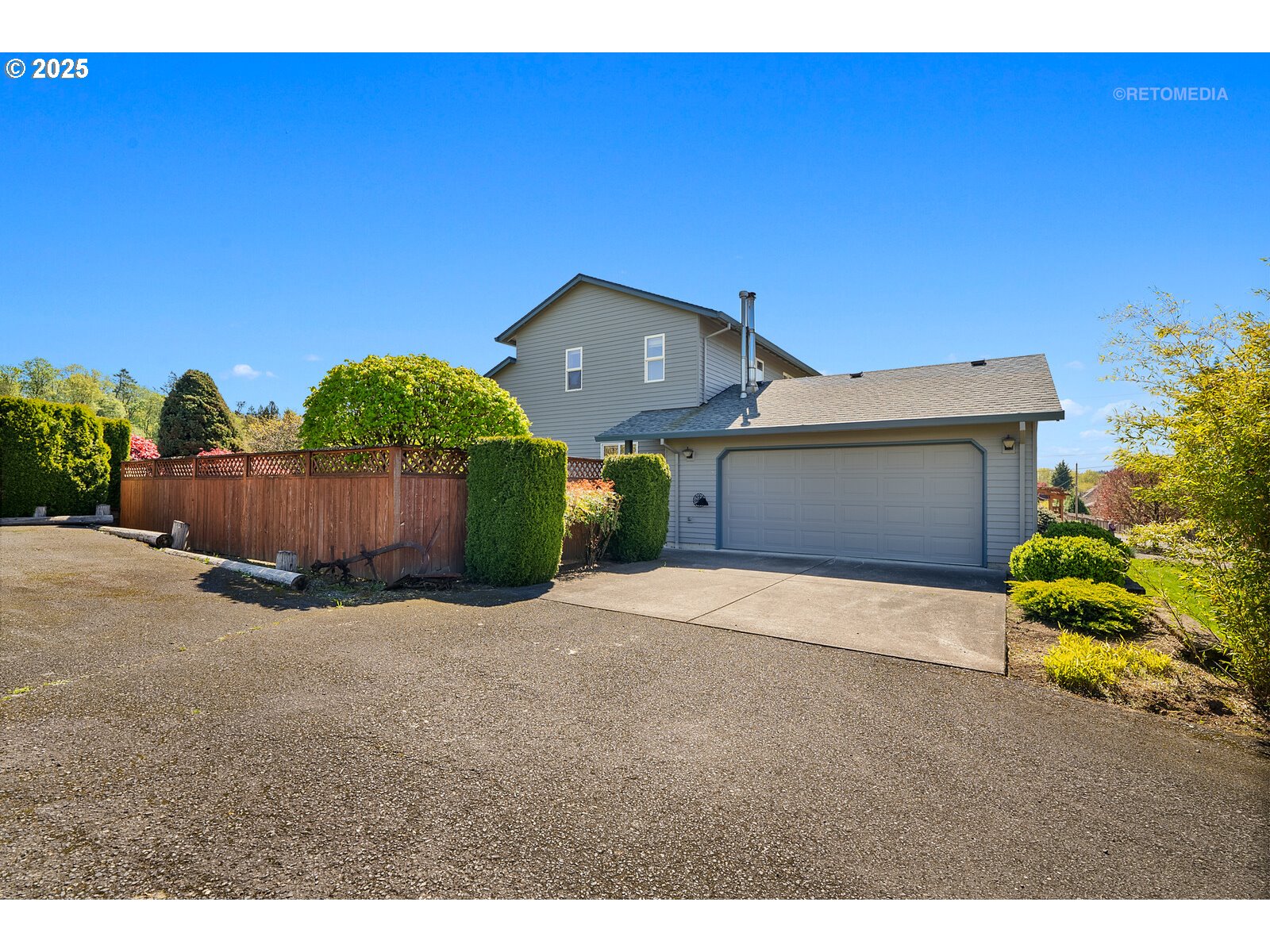 17233 Southeast McKinley Road Gresham, OR 97080 - Photo 44 of 48 a front view of a house with a yard and garage
