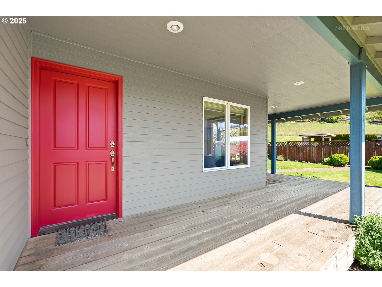 17233 Southeast McKinley Road Gresham, OR 97080 - Photo 5 of 48 a view of a red door and a yard