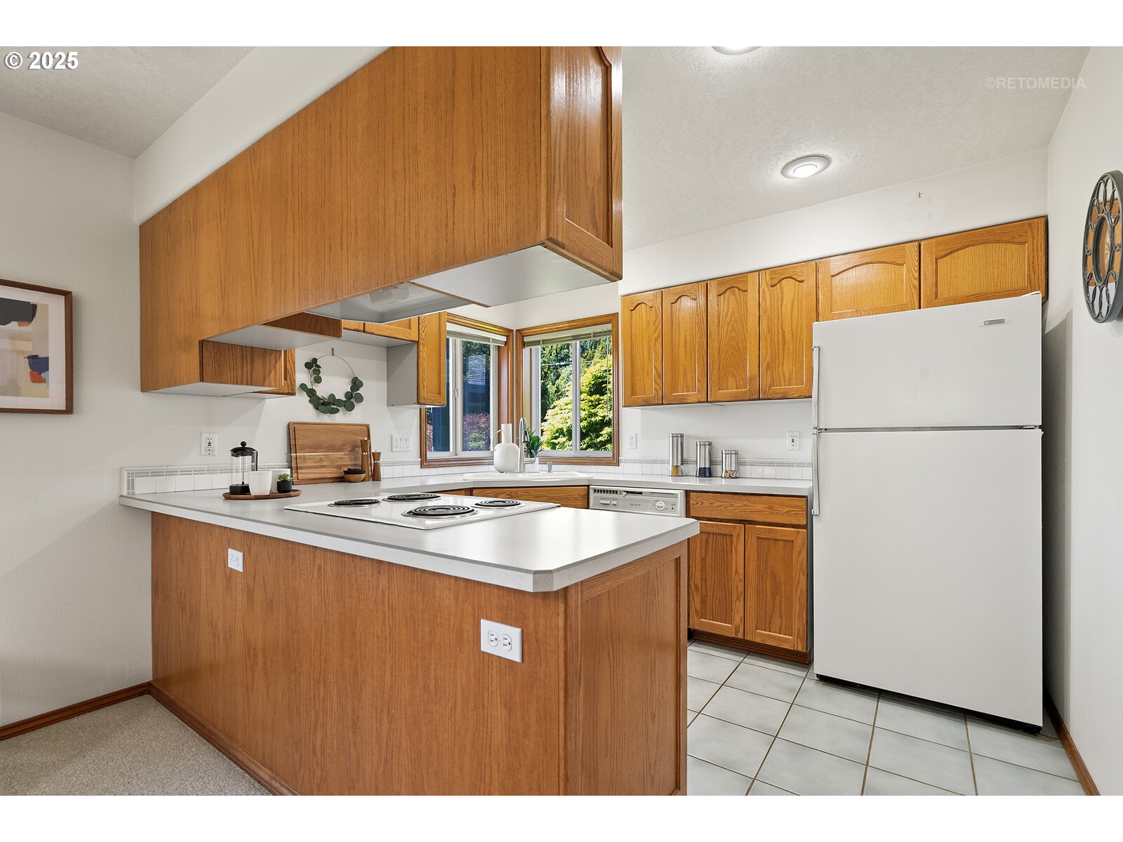 17233 Southeast McKinley Road Gresham, OR 97080 - Photo 10 of 48 a kitchen with stainless steel appliances granite countertop a sink stove and refrigerator