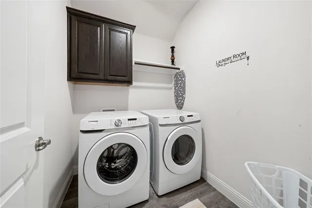 a utility room with dryer and washer