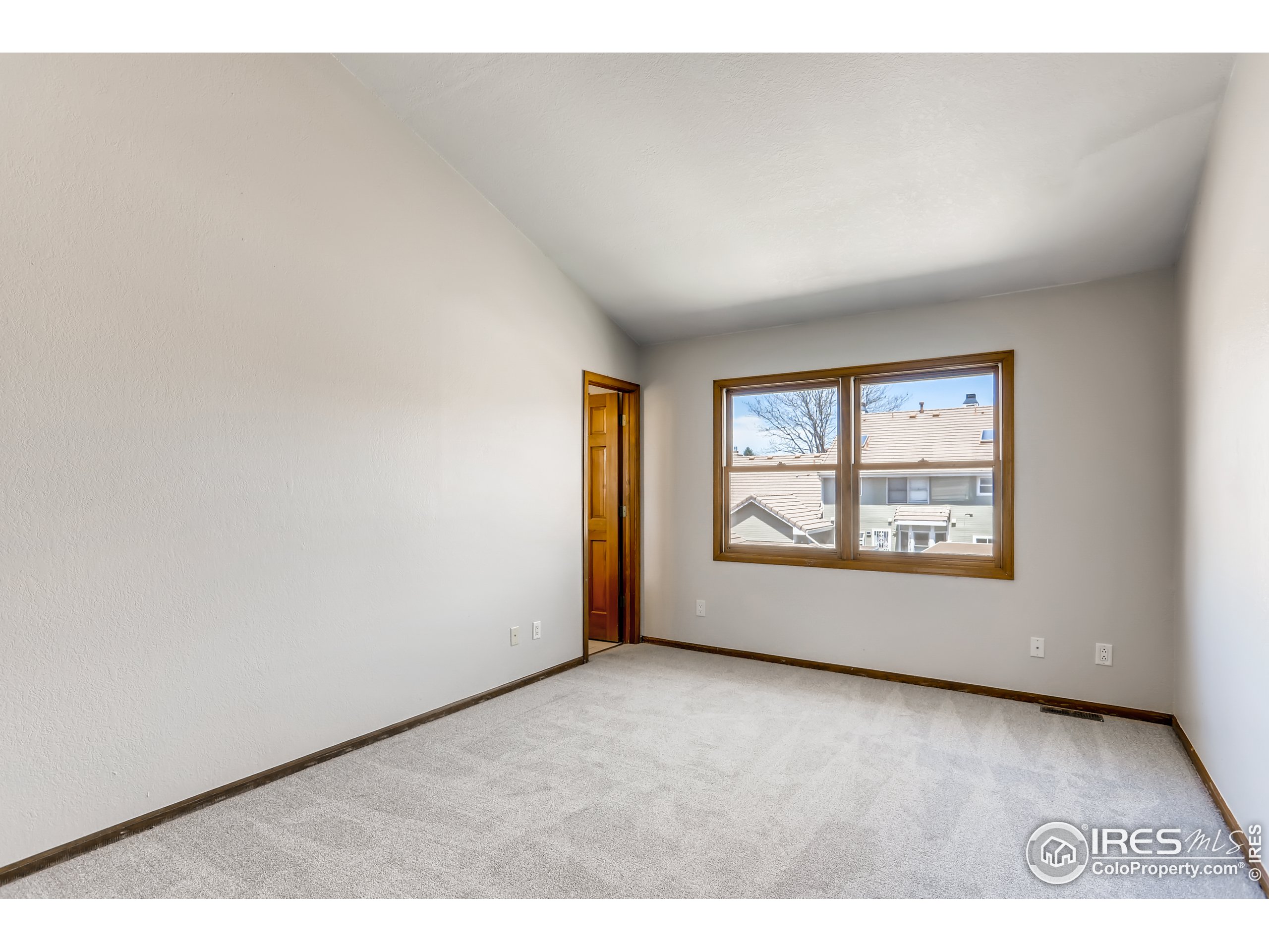 2315 Ranch Drive Westminster, CO 80234 - Photo 14 of 28 an empty room with windows