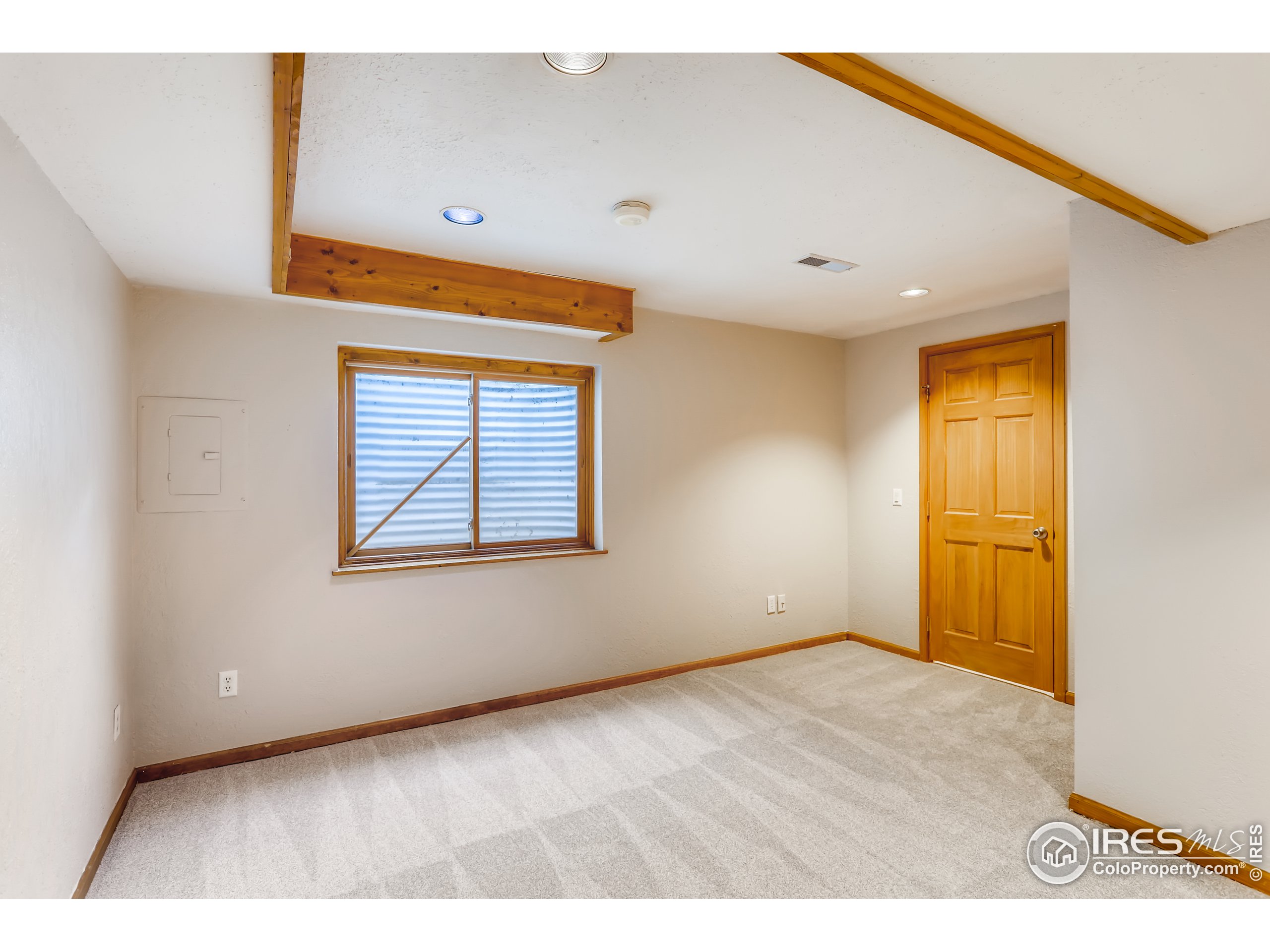 2315 Ranch Drive Westminster, CO 80234 - Photo 18 of 28 a view of an empty room with a window