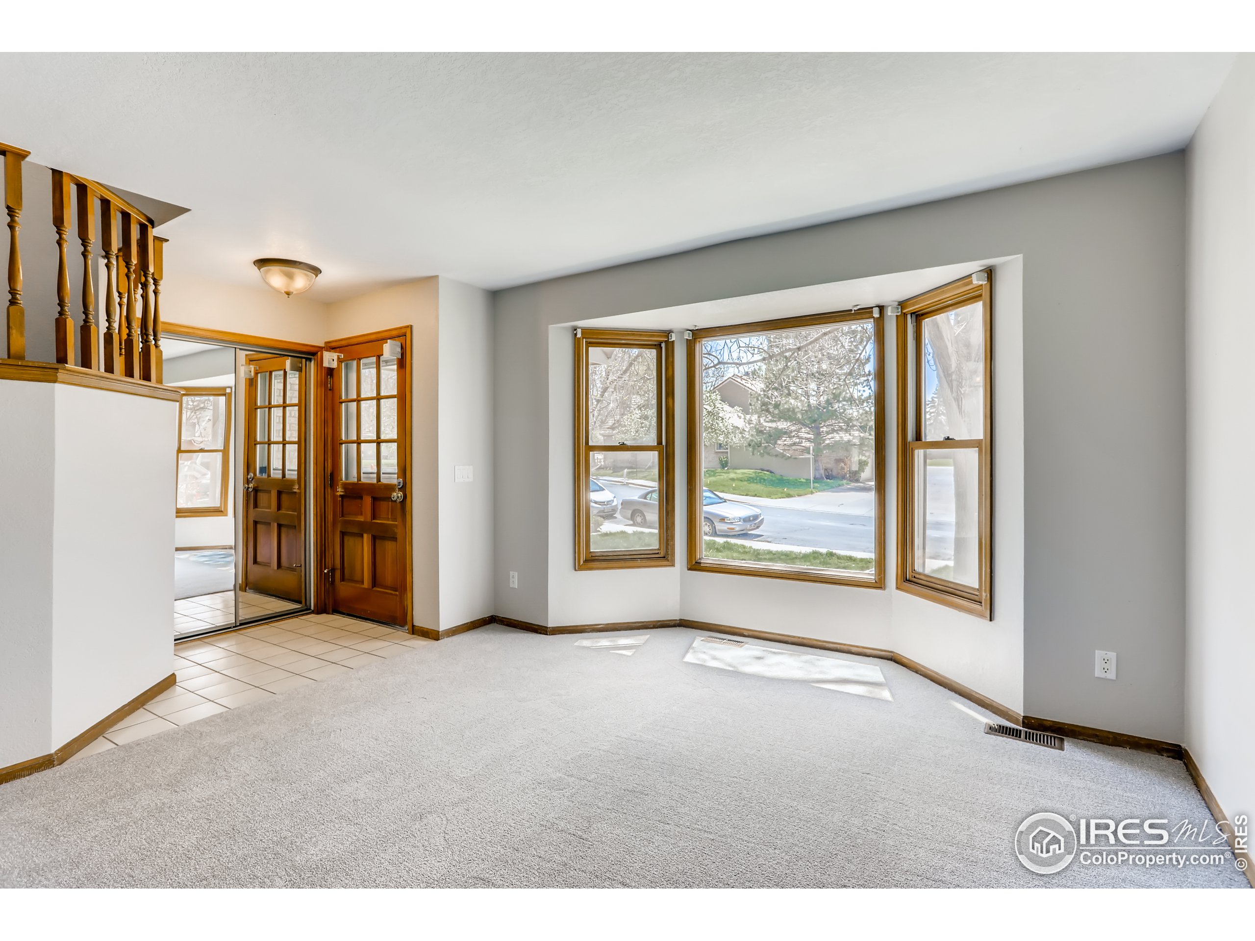 2315 Ranch Drive Westminster, CO 80234 - Photo 2 of 28 a view of an empty room with a window