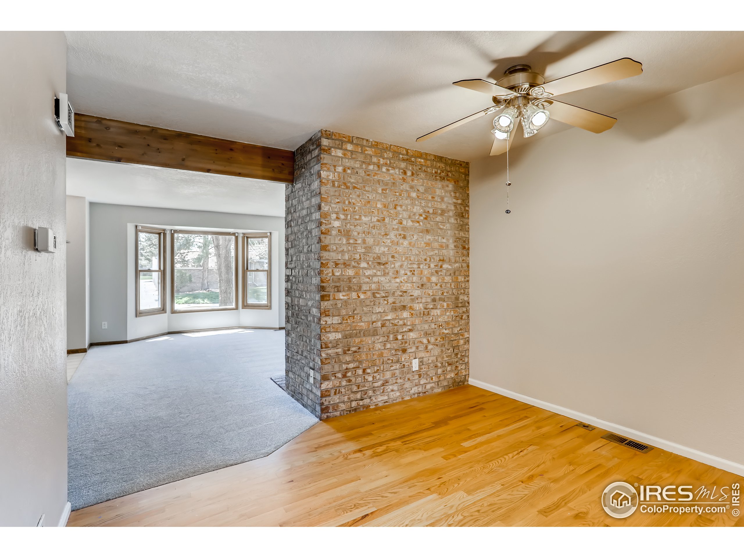 2315 Ranch Drive Westminster, CO 80234 - Photo 4 of 28 a view of an empty room and chandelier fan