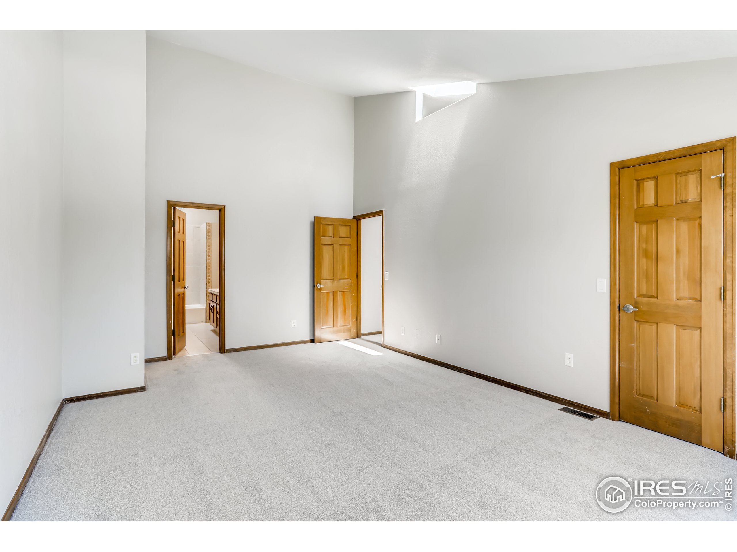 2315 Ranch Drive Westminster, CO 80234 - Photo 10 of 28 a view of an empty room with a window