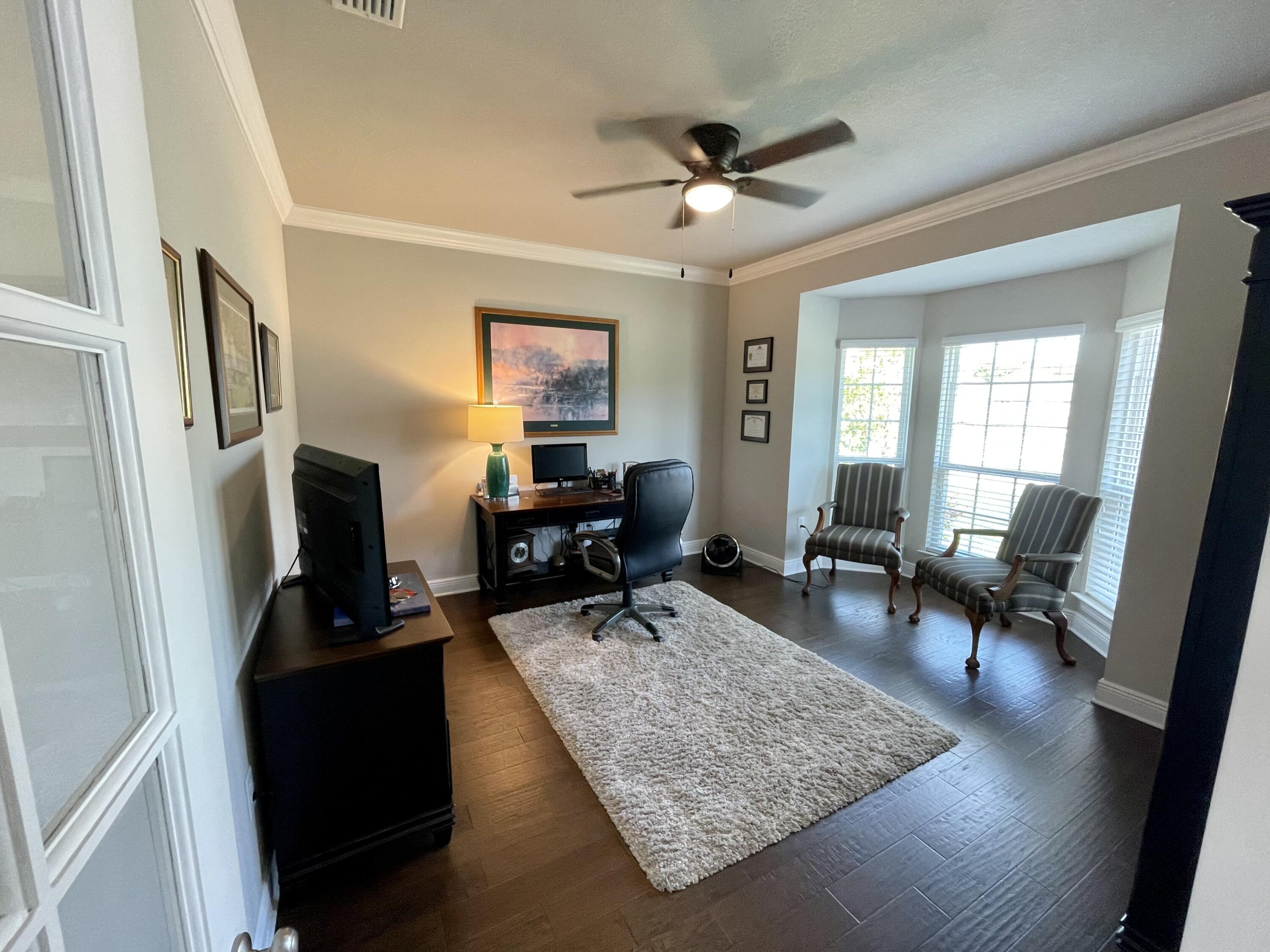16 Viper Road Santa Rosa Beach, FL 32459 - Photo 8 of 14 a living room with furniture and a flat screen tv