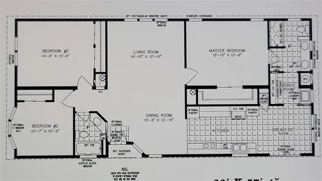a view of a yard with plants and large trees