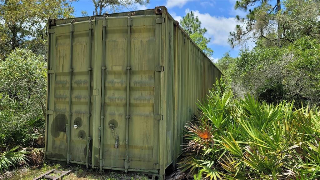 3690 Southeast 54th Avenue Morriston, FL 32668 - Photo 9 of 43 a green field with trees in the background