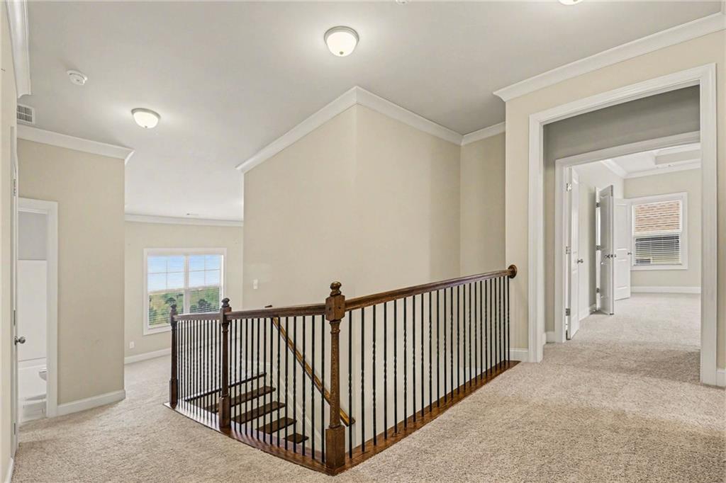 2960 Hampton Grv Trace Dacula, GA 30019 - Photo 14 of 33 a view of a hallway with a livingroom