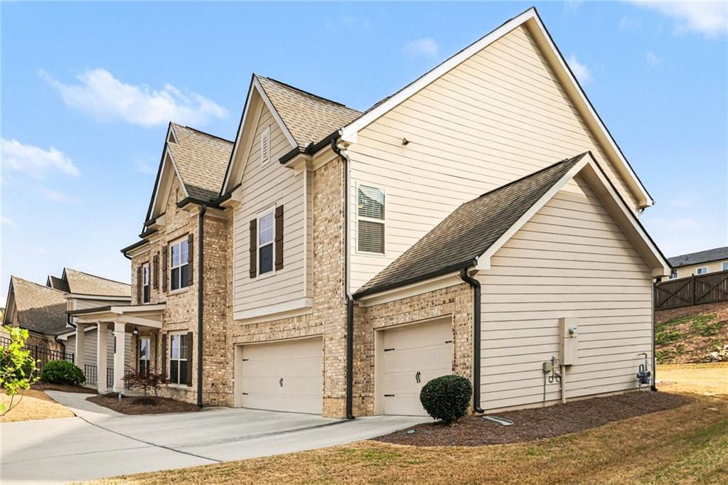 2960 Hampton Grv Trace Dacula, GA 30019 - Photo 2 of 33 a view of a house with a sink