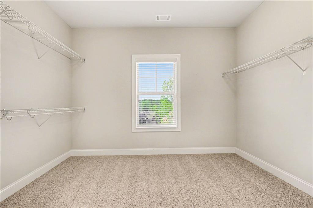2960 Hampton Grv Trace Dacula, GA 30019 - Photo 26 of 33 an empty room with a window