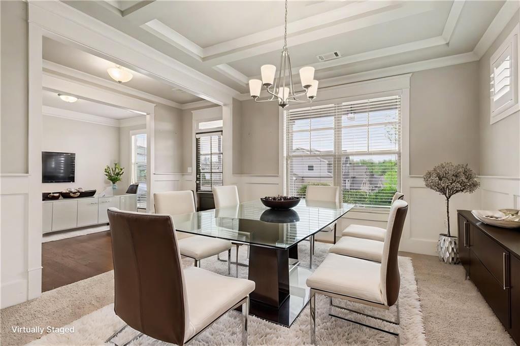 2960 Hampton Grv Trace Dacula, GA 30019 - Photo 7 of 33 a view of a dining room with furniture window and wooden floor