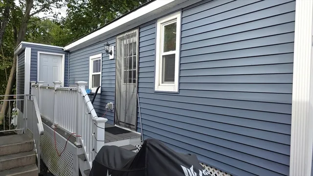 a view of a back yard of the house