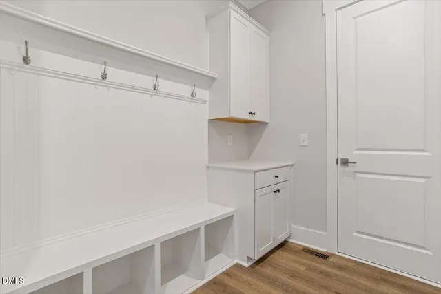 a bedroom with bed and window