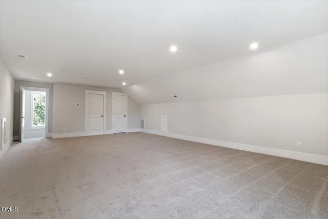 a kitchen with a sink and a refrigerator