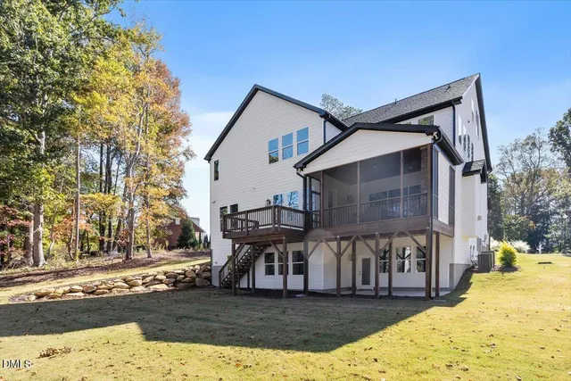 a swimming pool with trees in the background