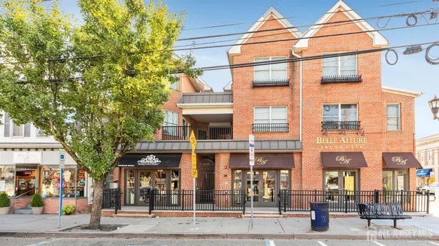 a front view of a building and a street
