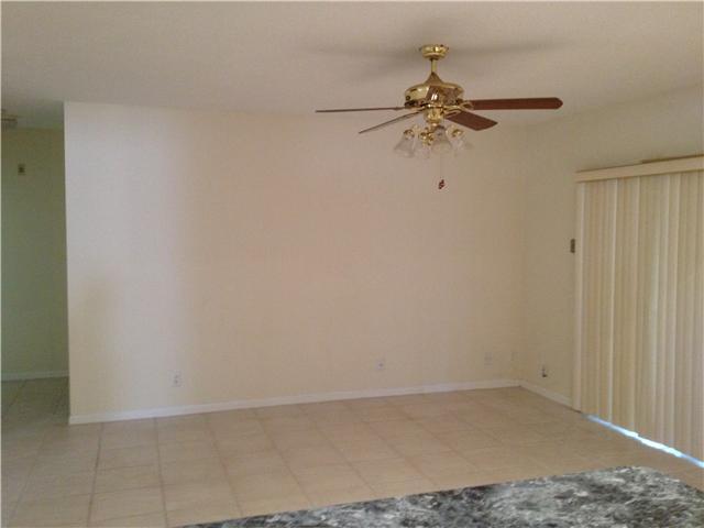 1045 Aspri Way Riviera Beach, FL 33418 - Photo 3 of 19 a view of a chandelier fan in a room