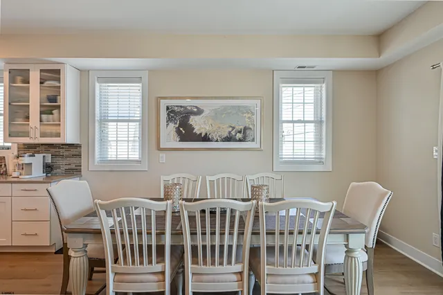 a view of a dining room with furniture