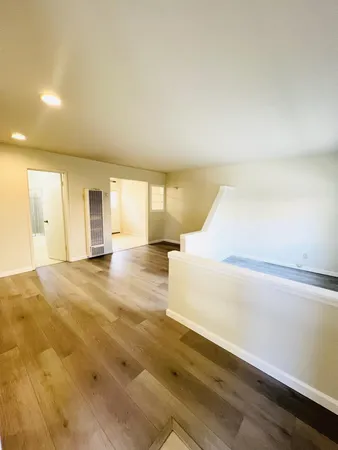 a spacious bathroom with a tub and shower