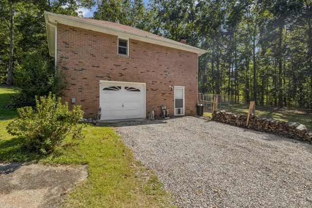 a view of a garage with parked cars