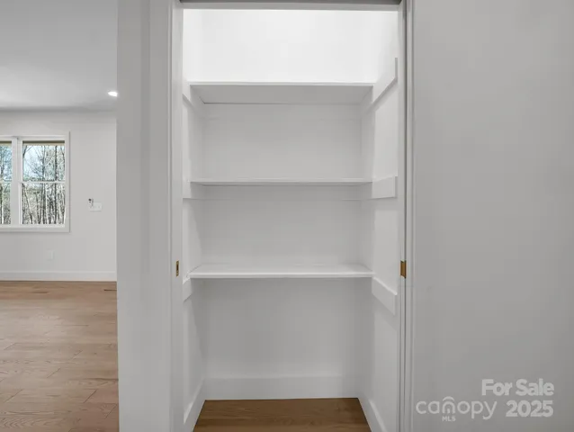 a bathroom with a shower and a toilet