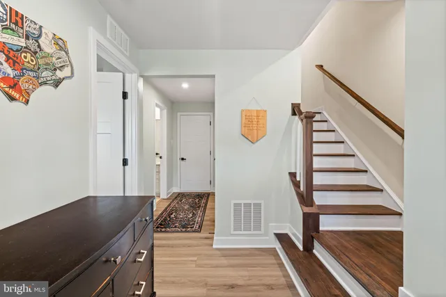 a view of a livingroom with wooden floor