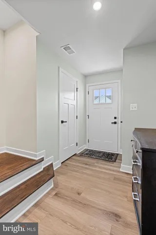 a workspace with furniture and a window