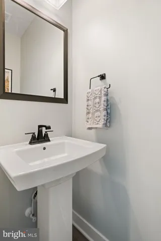 a view of a roof deck with furniture