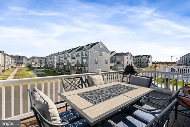 a view of a balcony with chairs