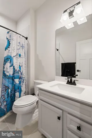 a aerial view of a house with a yard