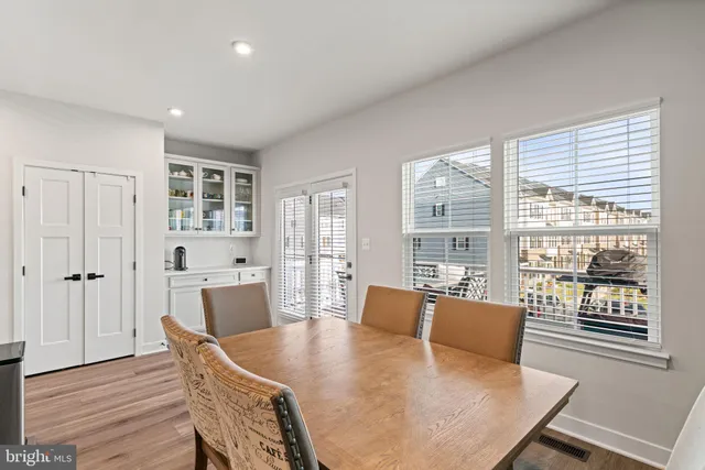 a spacious bathroom with a sink and a window