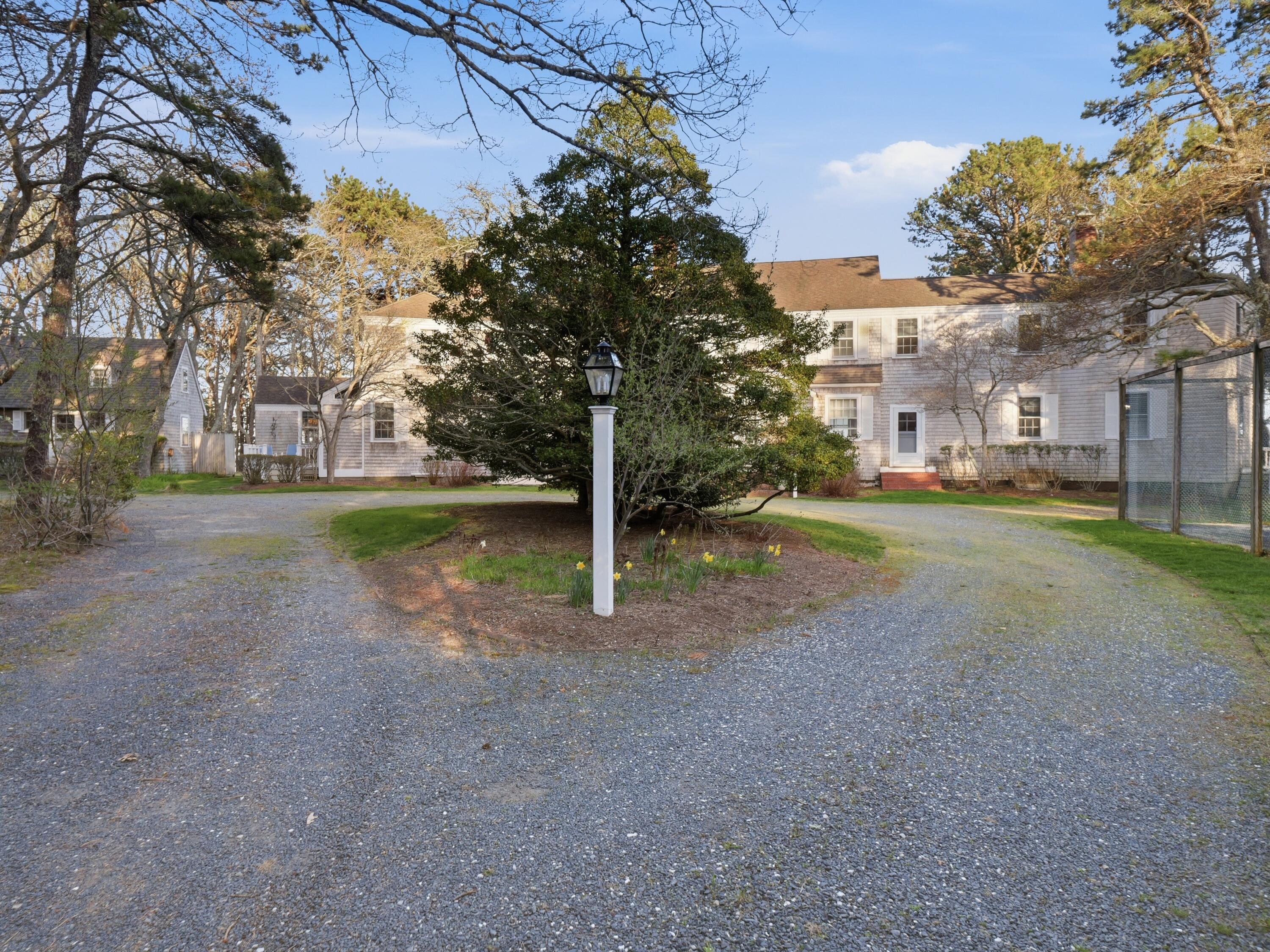 190 Vineyard Road Cotuit, MA 02635 - Photo 12 of 41 a view of a park with large trees