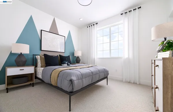 a bedroom with bed and window