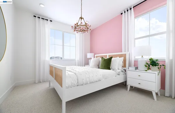 a bed room with a bed and a chandelier