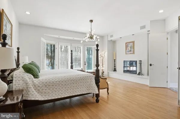 a bed room with a bed and a television