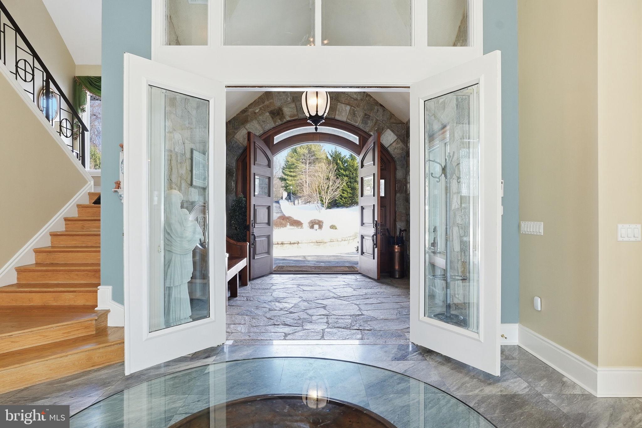 11940 River Road Potomac, MD 20854 - Photo 4 of 75 a view of entryway and hallway with a front door