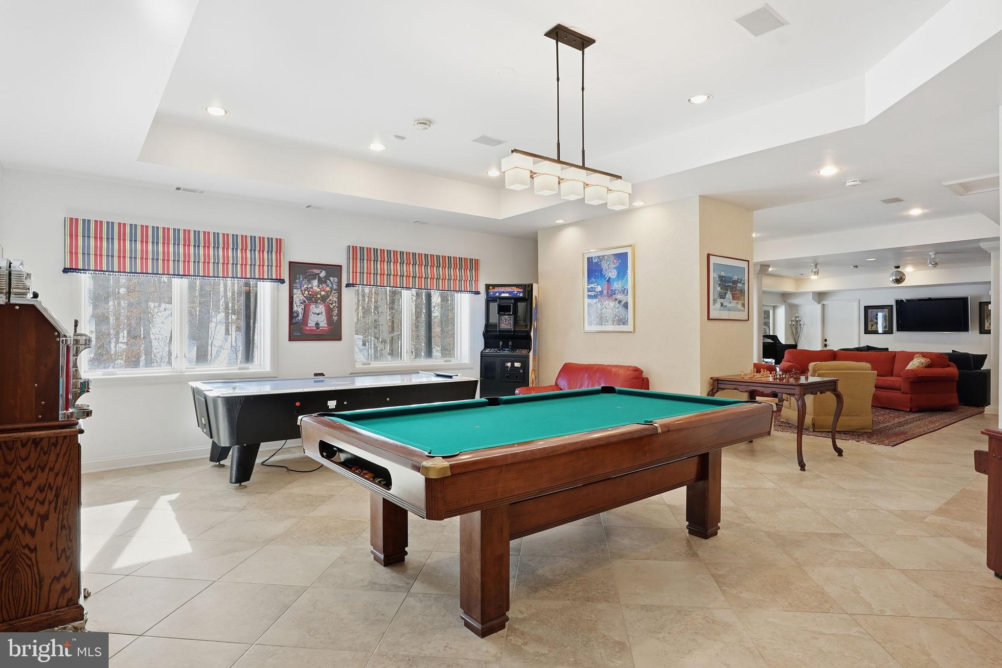 11940 River Road Potomac, MD 20854 - Photo 47 of 75 a room with pool table and windows
