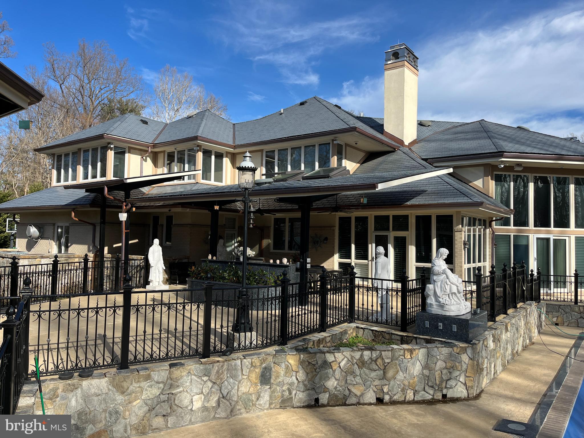 11940 River Road Potomac, MD 20854 - Photo 57 of 69 Hot Tub view of home and edge of Pool
