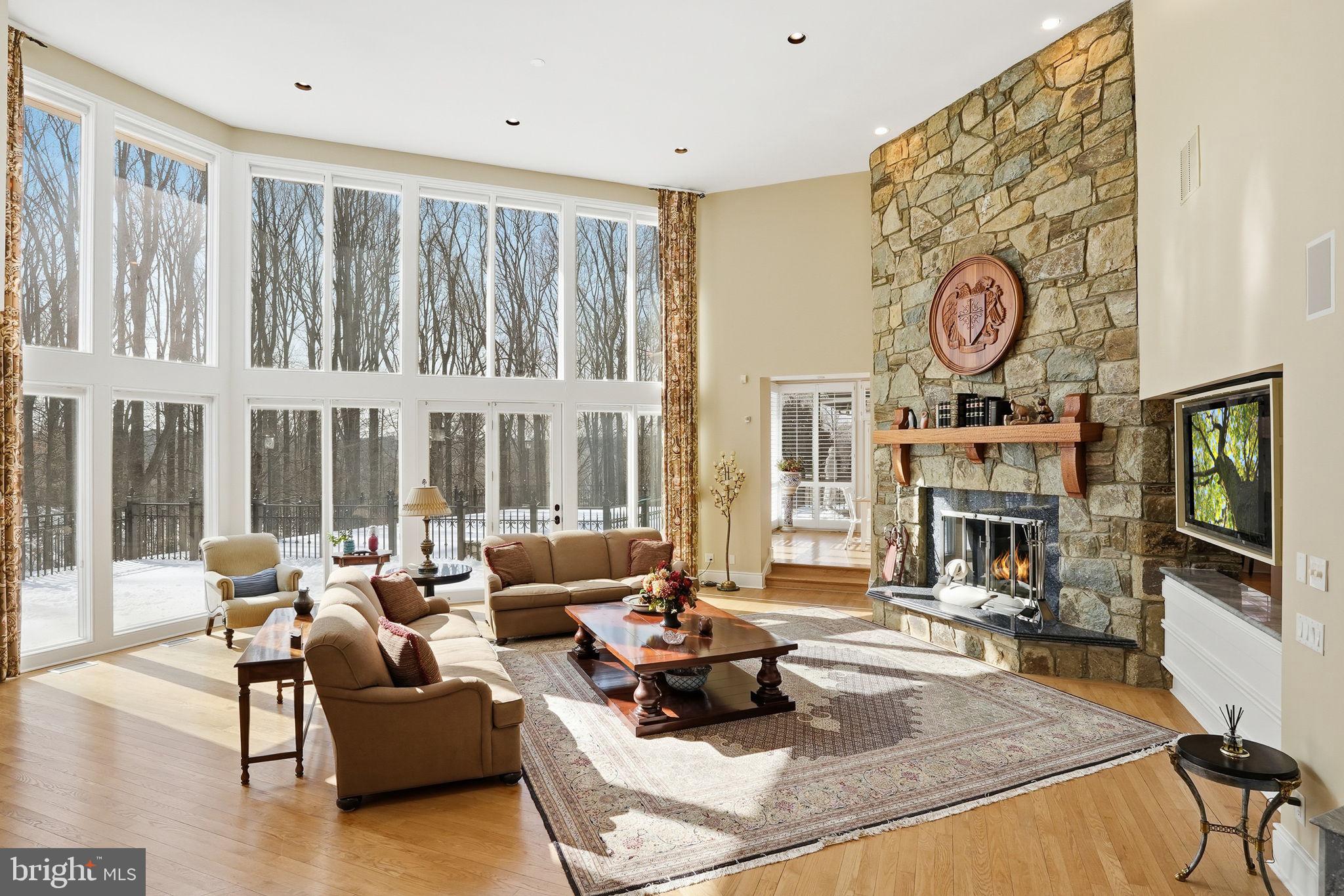 11940 River Road Potomac, MD 20854 - Photo 6 of 75 a living room with fireplace furniture and a large window